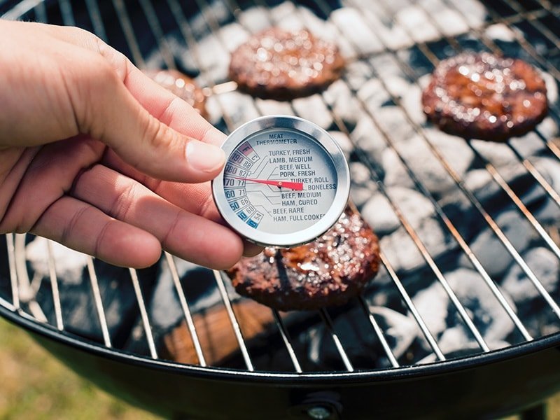 Bbq meats with a thermometer