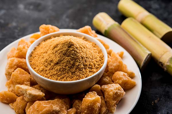 Organic gur or jaggery powder is unrefined sugar from concentrated sugarcane juice