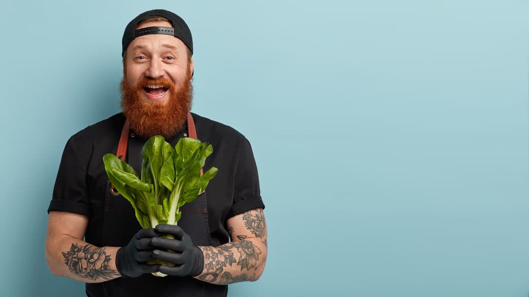 Man holding salad greens