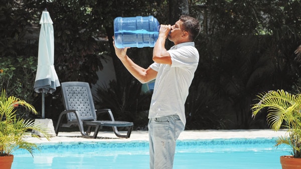 Man drinking water for hydration