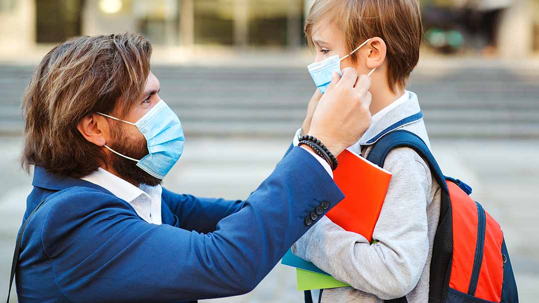 Dad sending kid to school