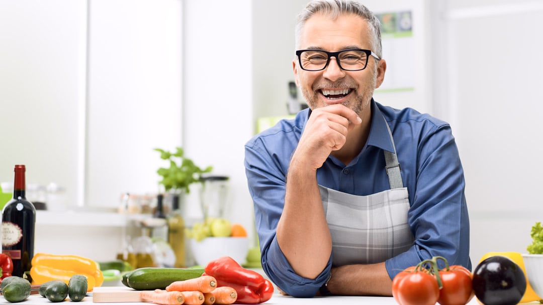 Mature man with vegetables