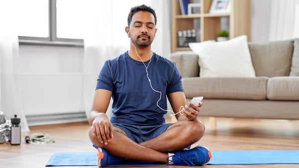 South asian man breathing deeply