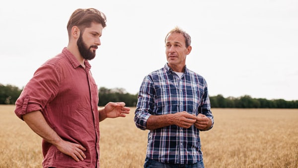 Rural men talking in a support group outside