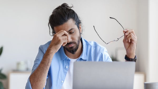 Stressed man at desk