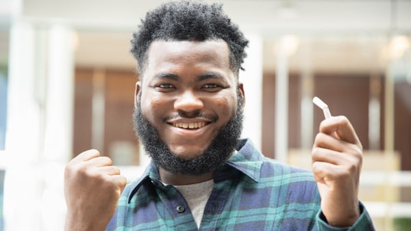 Happy man with broken smoke