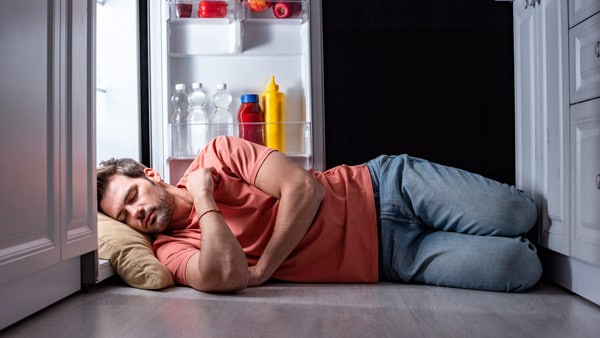 Man sleeping in kitchen