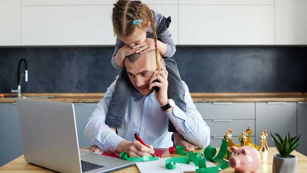 Busy man with daughter