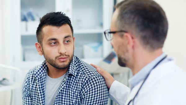 Man talking to a doctor