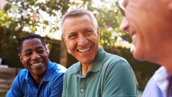 Three men talking